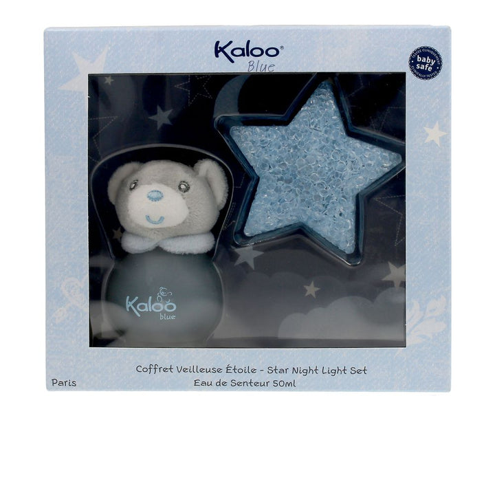 Gift set with rounded translucent perfume bottle and small plush bear, citrus-floral scent