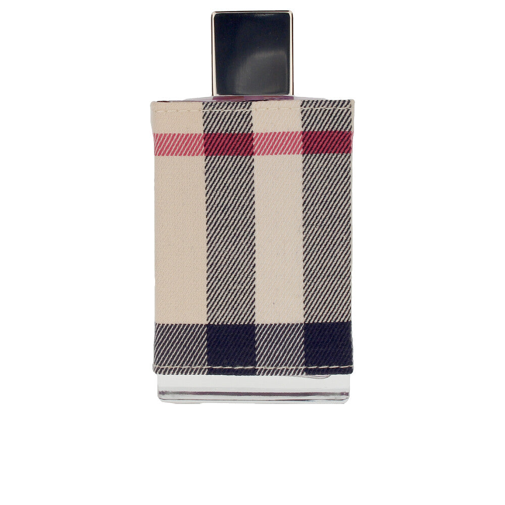 Clear glass perfume bottle with floral scent, 100 ml, signature check detail