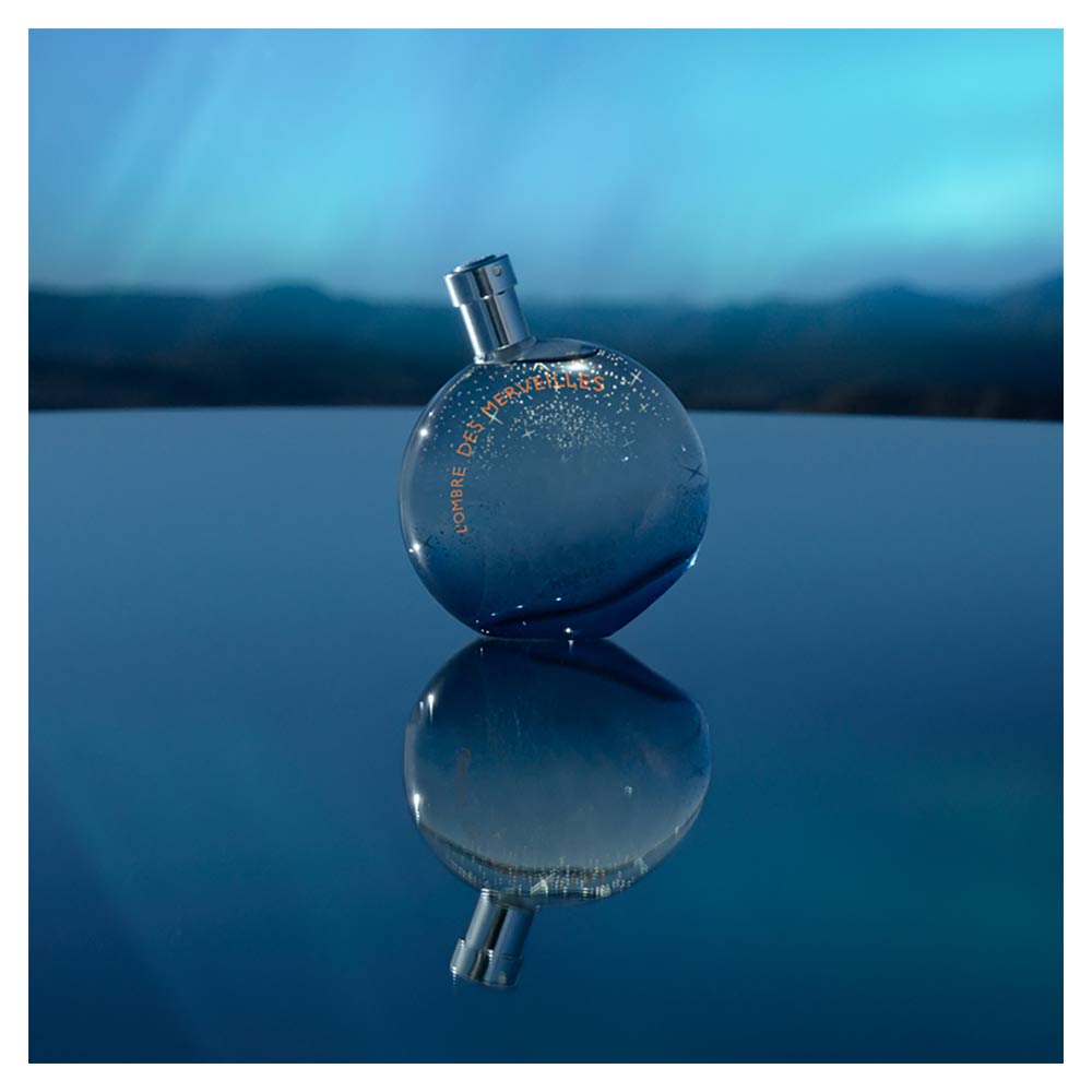 Rounded glass bottle of woody oriental Eau de Parfum, 100 ml, Unisex