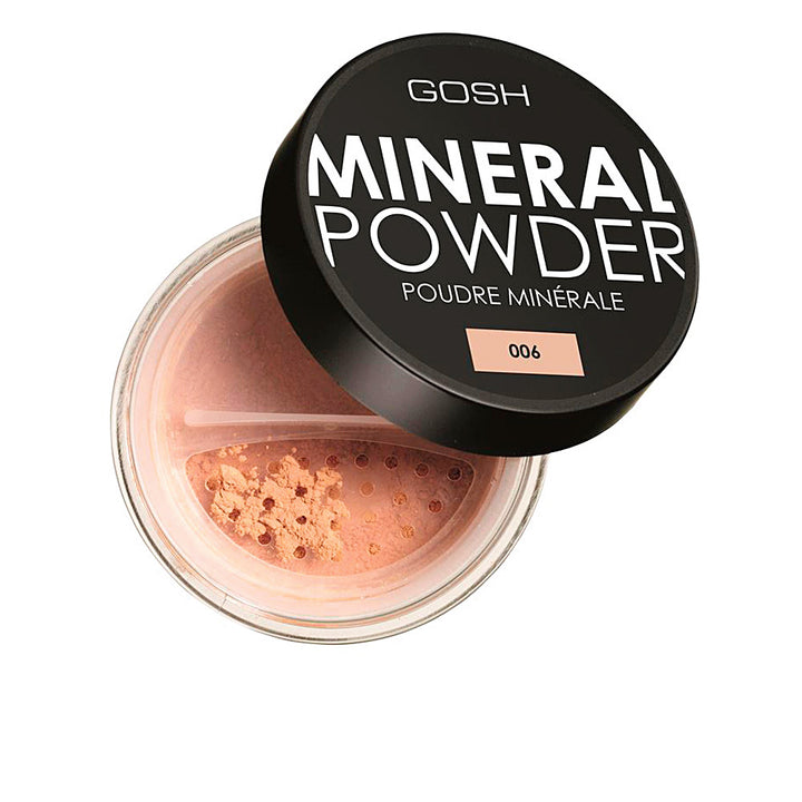 Small jar of loose mineral powder in honey shade with soft matte finish