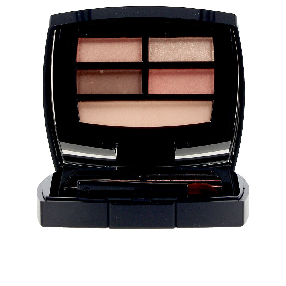 Compact palette of five warm matte and satin eyeshadows with mirror and two applicators