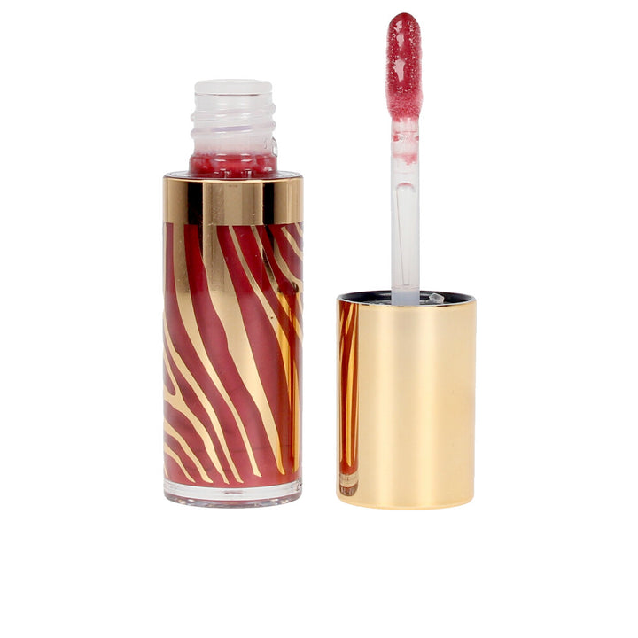 Sheer sunset-toned lip gloss tube, 6.5 ml, luminous finish