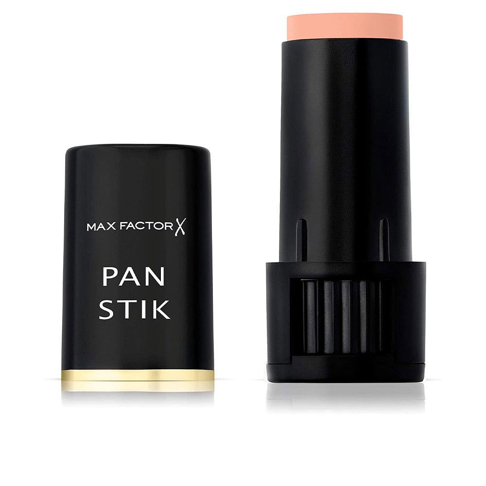 Cream-to-stick corrector 9 g in deep olive shade, compact twist tube
