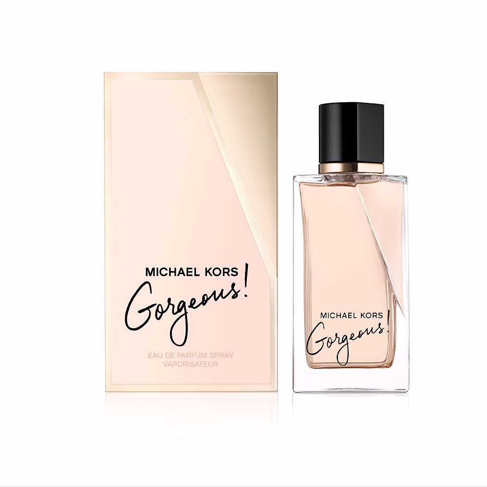 Glass perfume bottle with amber-coloured liquid and minimalist label, women's fragrance