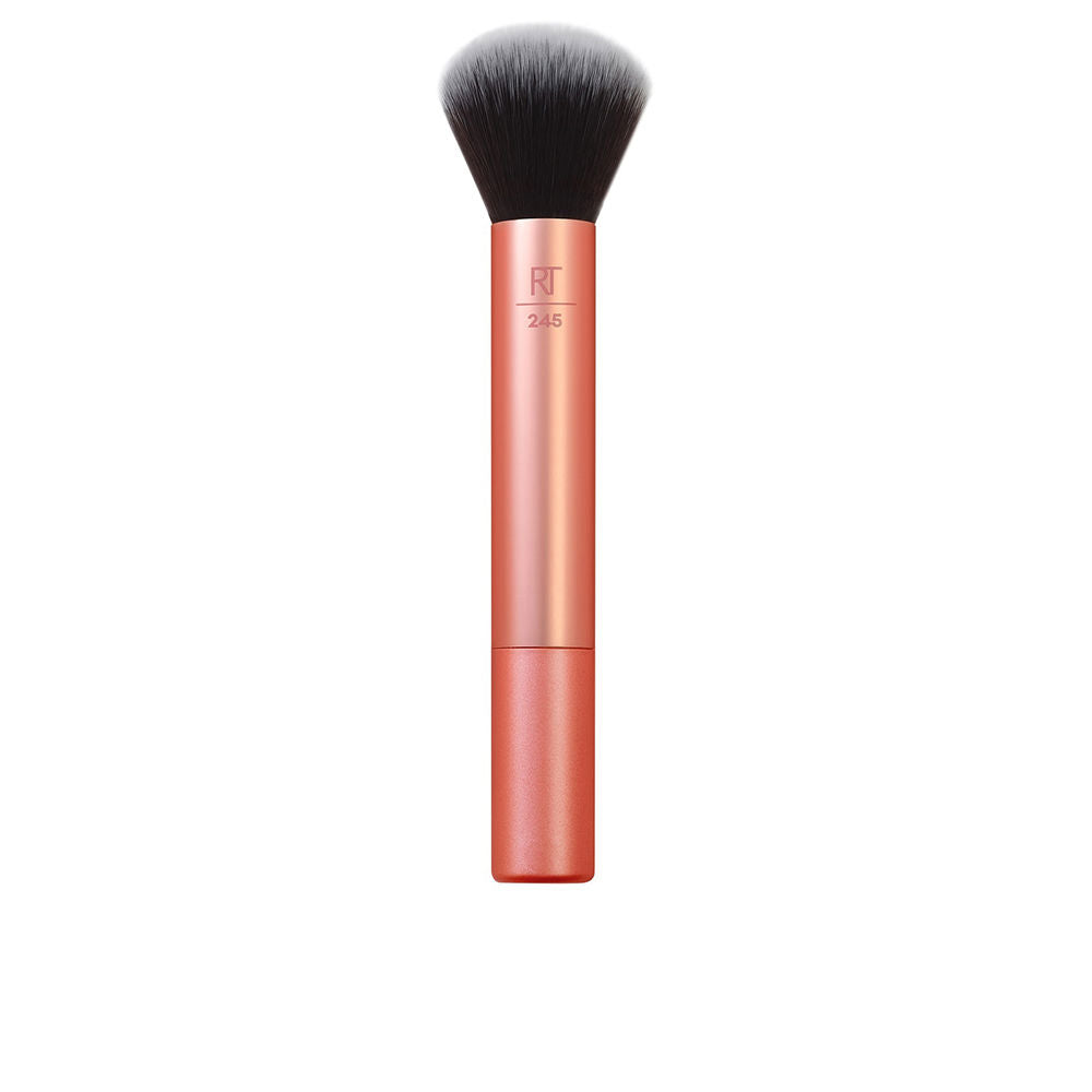 Plush vegan fibre face brush with compact head and smooth handle for Women