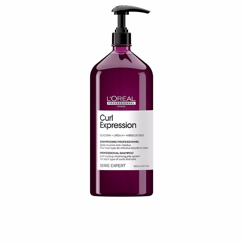 Tall 1.5 litre pump bottle of creamy curl cleansing gel, labelled for women with floral fragrance