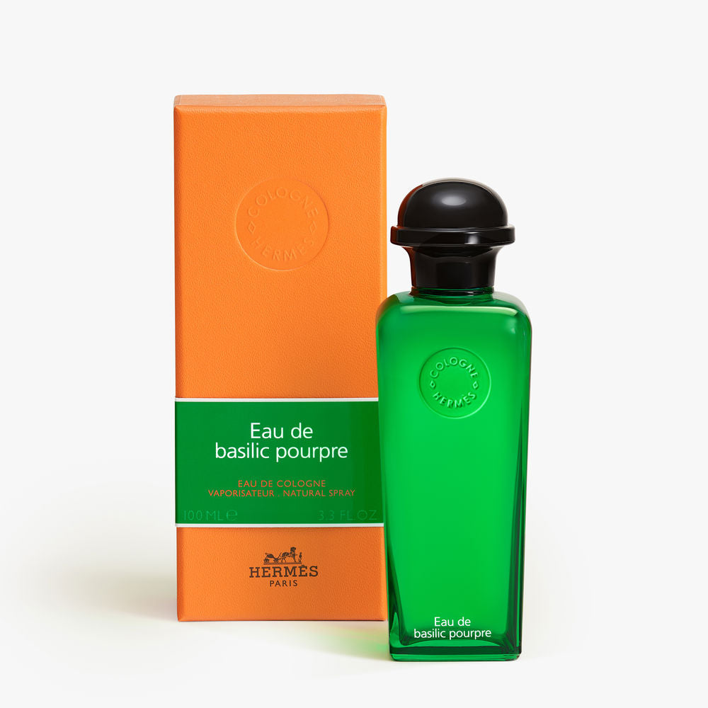 Radiant green lantern-shaped perfume bottle with orange case, 100 ml cologne