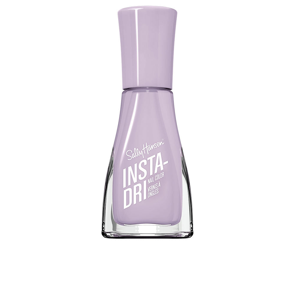 Small 9.17 ml bottle of fast‑dry cream nail polish with contoured brush, neutral shade