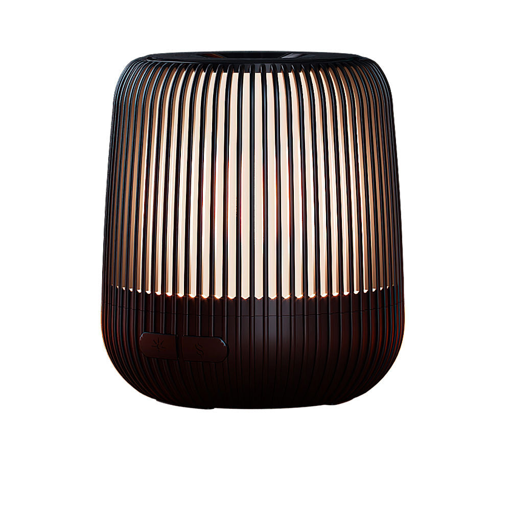 Compact white ceramic ultrasonic diffuser with parallel-line design and soft LED glow