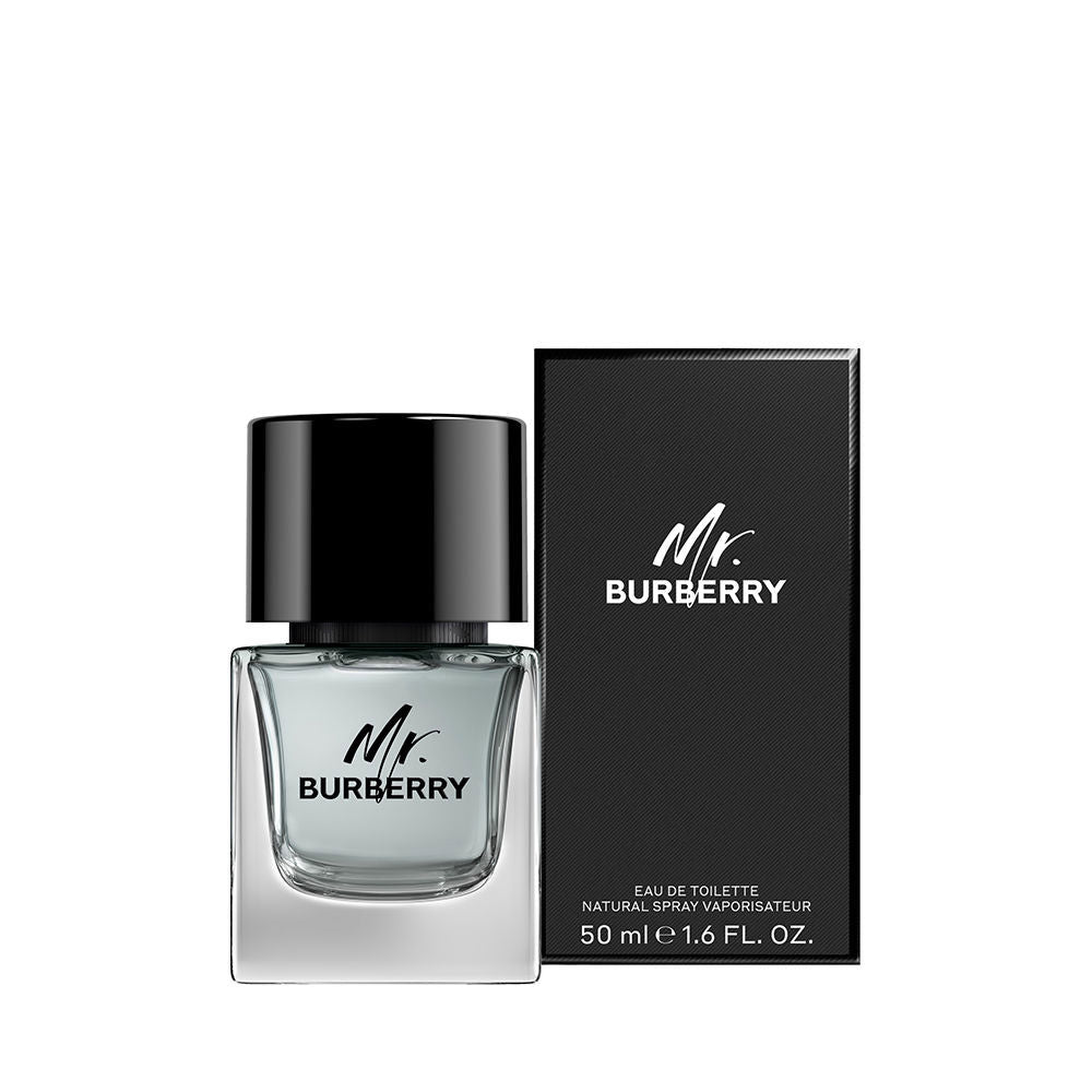 Transparent glass 50 ml eau de toilette with black cap and tie; aromatic woody notes
