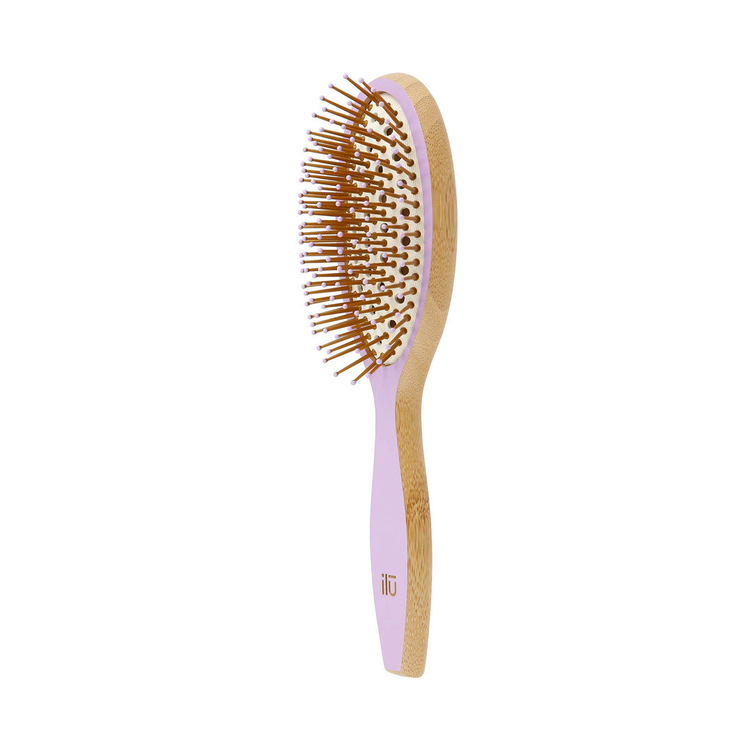 Oval bamboo hairbrush in lavender tone with vented cushion and anti‑static bristles