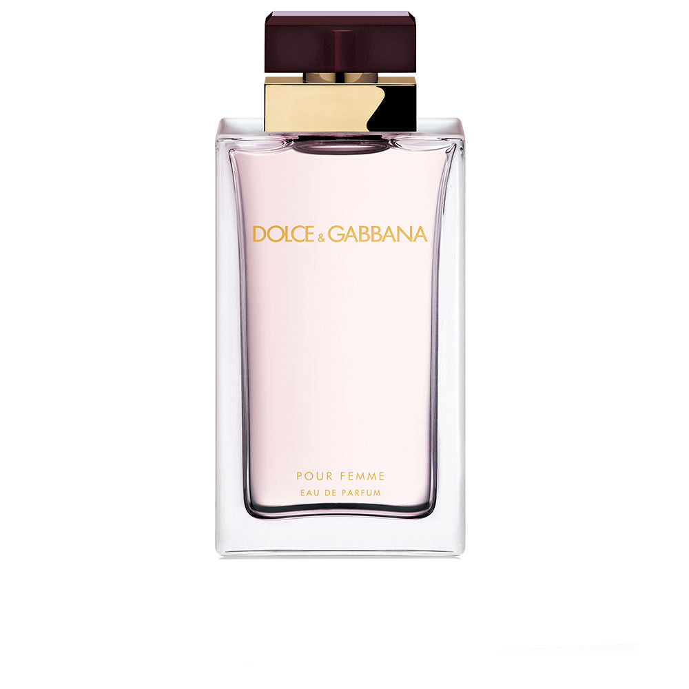 Clear glass 100 ml eau de parfum bottle with pale red liquid and carmine cap