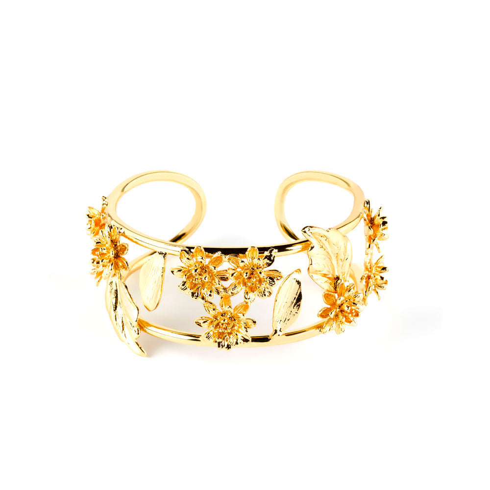 Bright gold open-back cuff bracelet with leaf and flower pattern, 2.5 cm wide