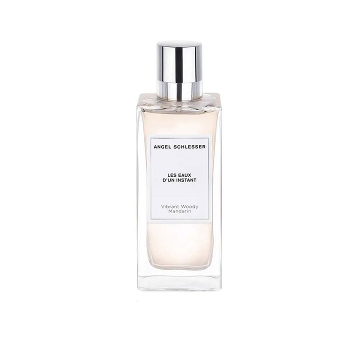 Clear glass bottle of Vibrant Woody Mandarin EDP, 100 ml, Unisex citrus-woody fragrance