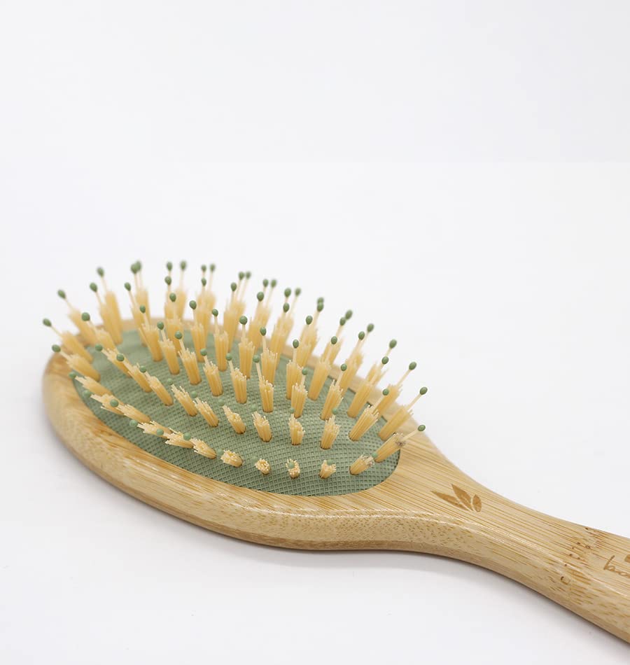 Small bamboo hairbrush with mixed nylon pins, compact travel size for Women