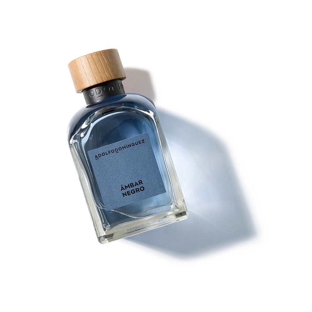 120 ml amber-hued eau de parfum in recycled glass bottle with wooden cap