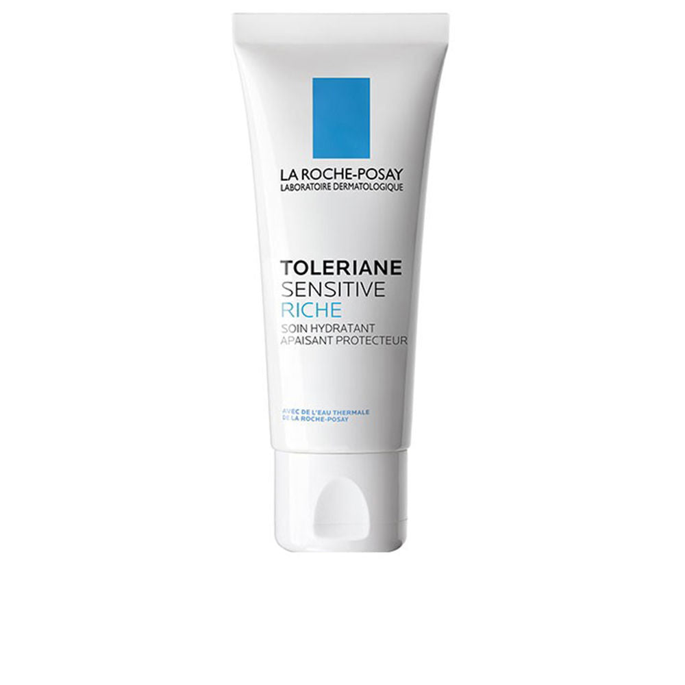 la Roche Posay White plastic tube with blue and black text, flip-top cap, minimalist skincare cream packaging