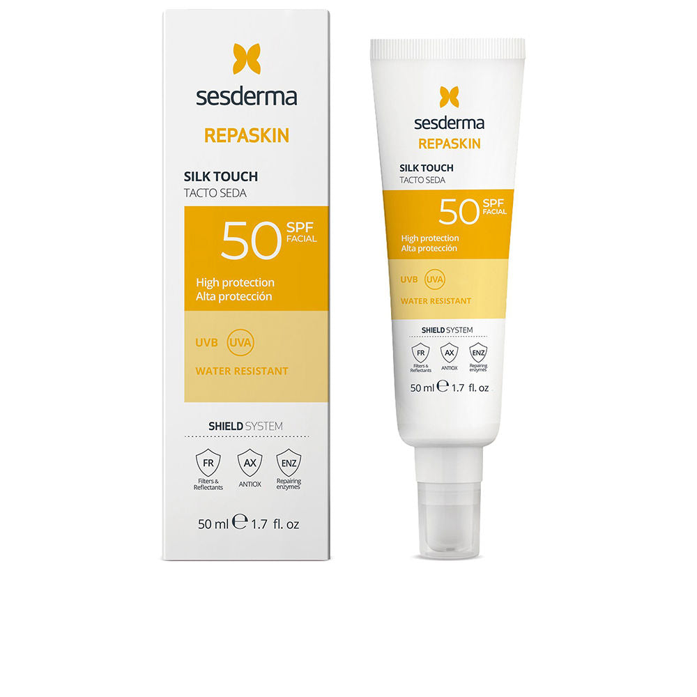 Sesderma White and yellow plastic tube with pump next to orange-accented box, minimalist modern facial sunscreen