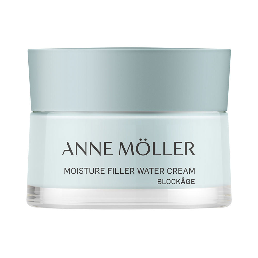 Anne Möller Light blue cylindrical plastic jar with screw-on matte lid, transparent base and printed text