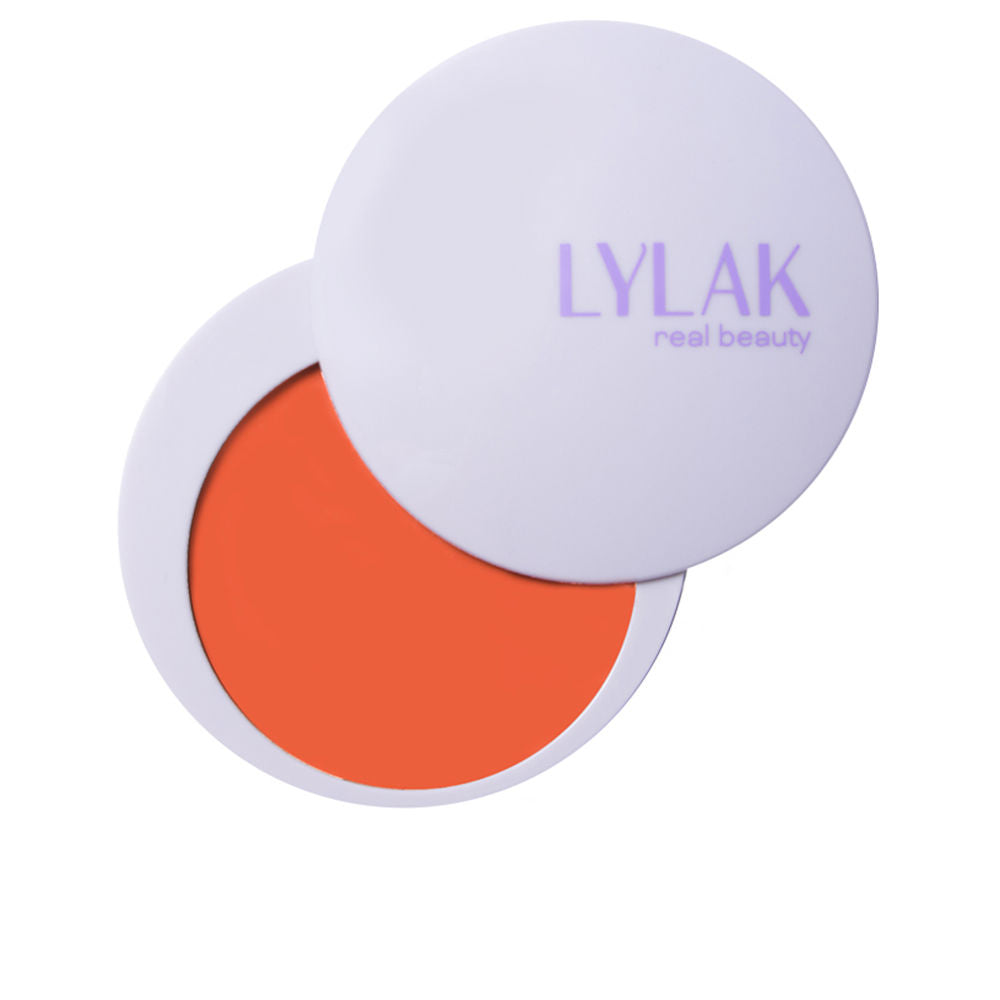 Compact cream blush in warm orange shade, refillable 5.6 ml tube