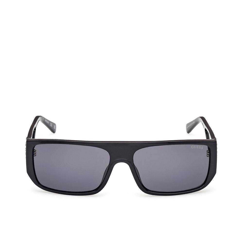 Guess rectangular black plastic sunglasses with thick frame, dark tinted lenses, straight temples, lens logo