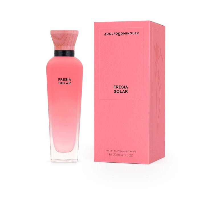 Adolfo Dominguez Recycled glass perfume bottle with wooden cap, soft freesia-colored liquid, refined cylindrical silhouette