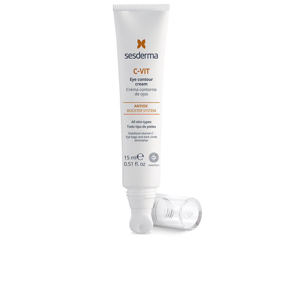 Sesderma Vitamin C eye cream tube beside a soft spill of cream on a neutral background
