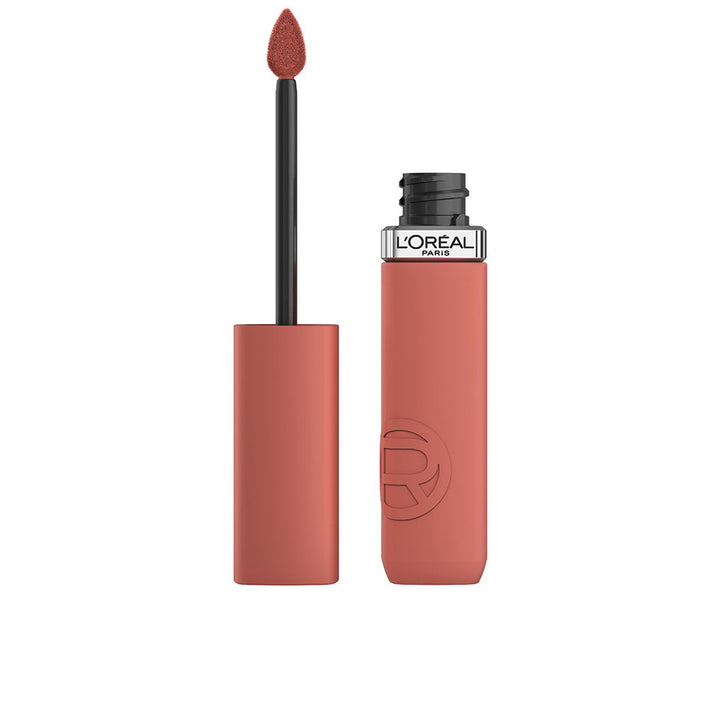 Tube of liquid matte lipstick, warm rose shade, doe-foot applicator visible