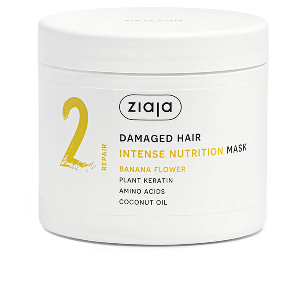 350 ml cream hair mask tub, banana flower label, warm woody fragrance notes