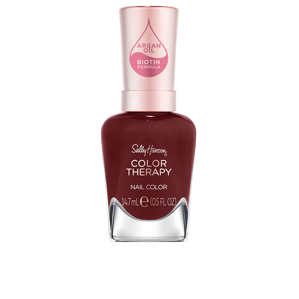 Bottle of deep garnet argan-infused nail lacquer, 14.7 ml, high-gloss finish