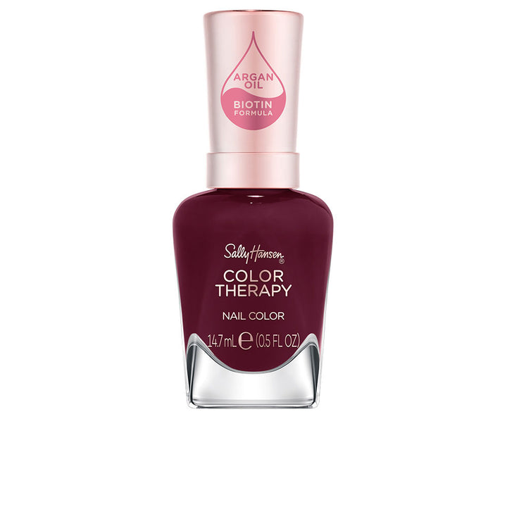Bottle of deep garnet nail polish, 14.7 ml, cream finish