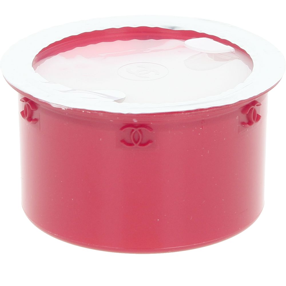 Elegant jar of No. 1 De Chanel gel-cream against neutral background