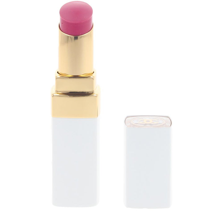 3 g clear‑topped treatment lip balm in raspberry tint with glossy finish