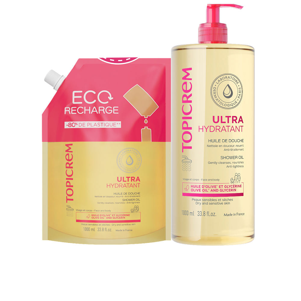 Topicrem Pink and yellow transparent plastic shower oil bottle with pump and matching refill pouch, front text visible