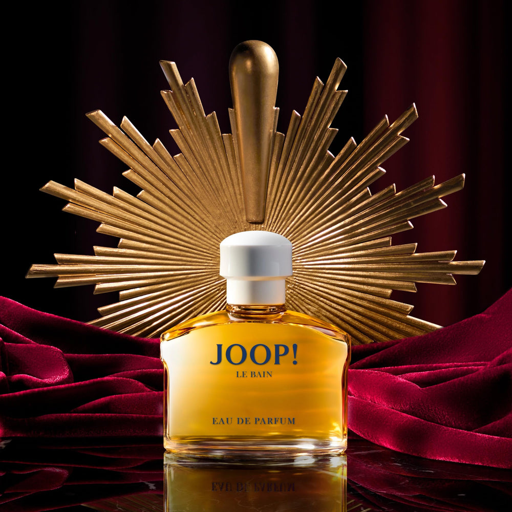75 ml amber-hued eau de parfum bottle; warm floral-oriental fragrance for Women