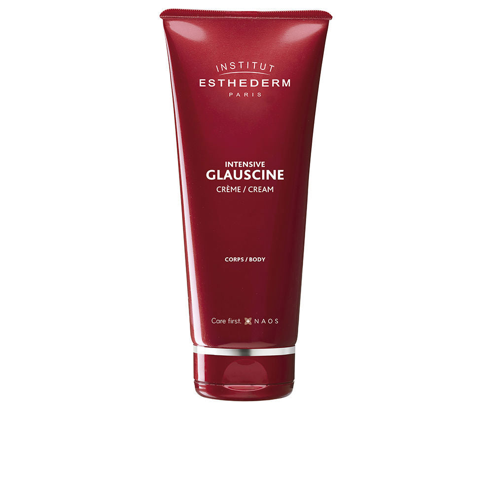 Jar of Institut Esthederm cellulite cream beside soft textile and botanical accents