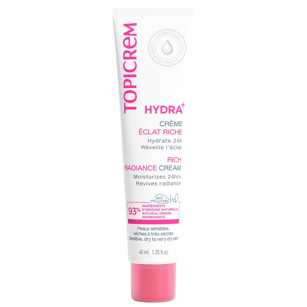 Topicrem White face cream tube with pink screw cap, minimalist plastic packaging, vertical brand name text visible