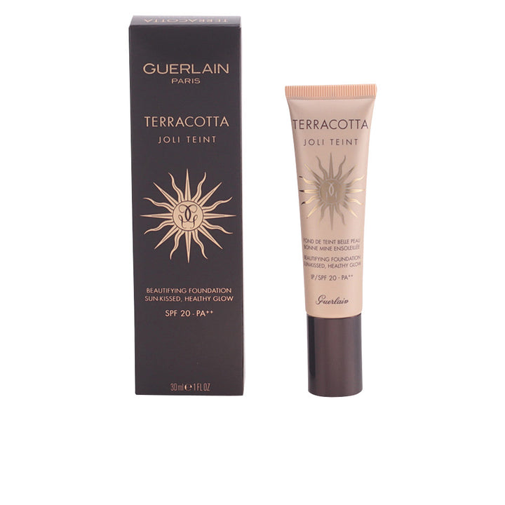 Glass bottle of terracotta liquid foundation, warm golden shade, 30 ml