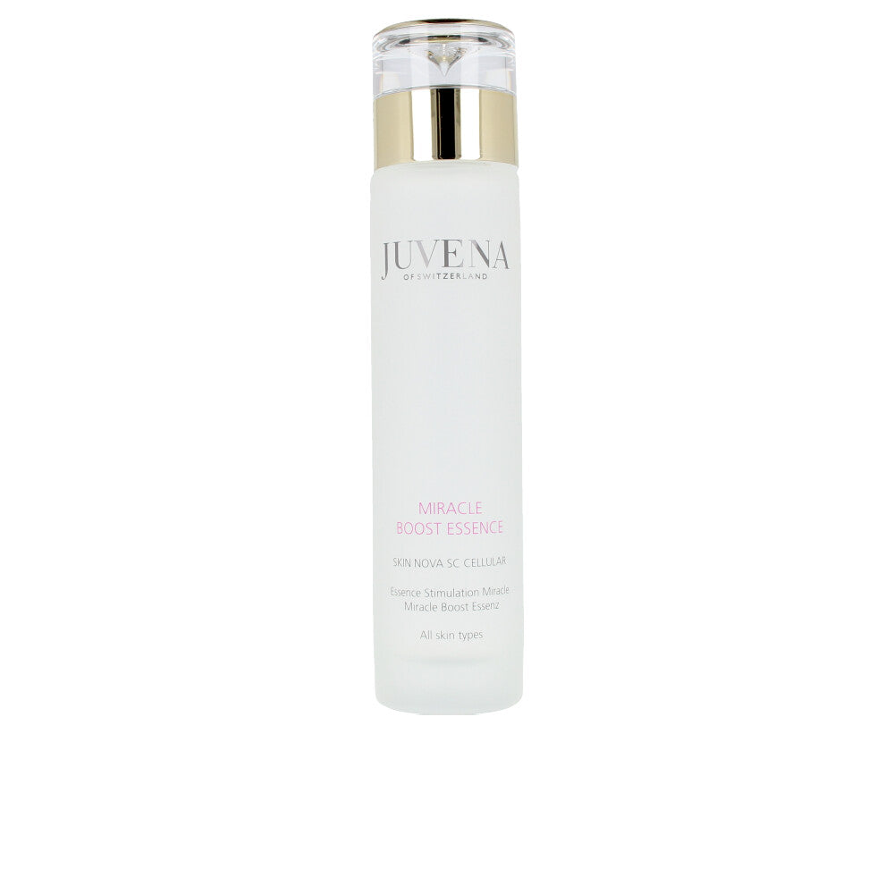 Juvena Minimalist white plastic skin essence bottle with transparent cap, gold band, cylindrical shape and printed text