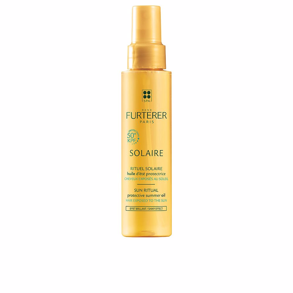 Transparent yellow plastic spray bottle of protective hair oil with printed text and visible spray nozzle, Rene Furterer