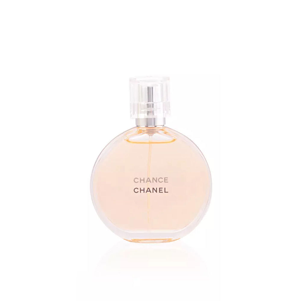 Round glass bottle of chipre-floral Eau de Toilette, 35 ml, pale golden liquid