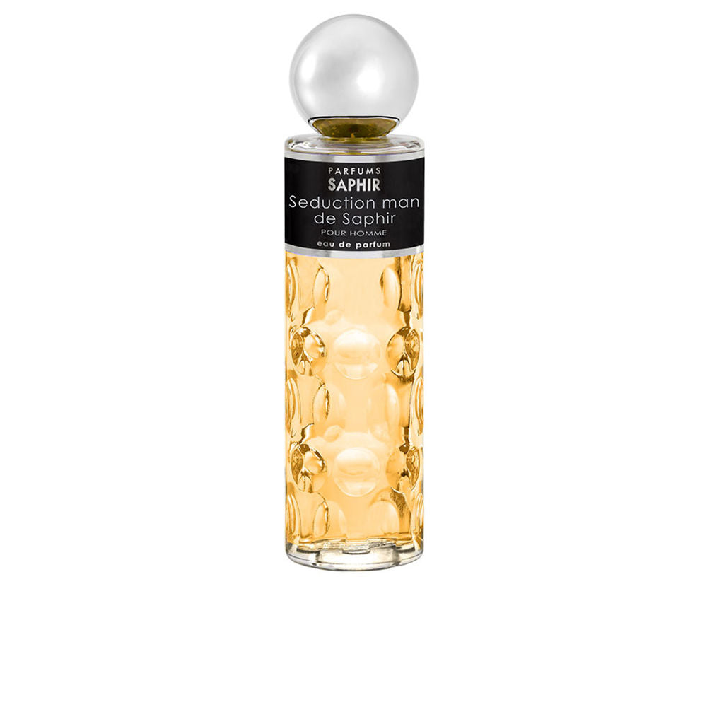 Parfums Saphir Glass eau de parfum bottle showing amber liquid, round textured body, large spherical cap, black label.