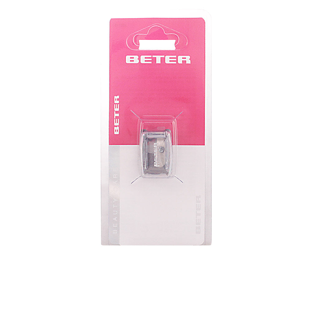 Beter Compact pink and white plastic and metal pencil sharpener with silver blade and removable reservoir