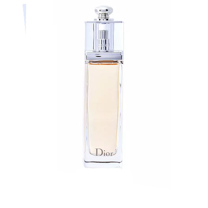 Dior Addict Eau de Toilette bottle—transparent luminous silhouette with warm floral-oriental fragrance.