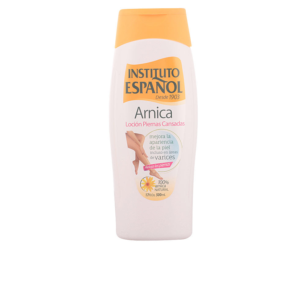 Instituto Español White and orange plastic lotion bottle with flip-top cap, label showing legs and flower graphic
