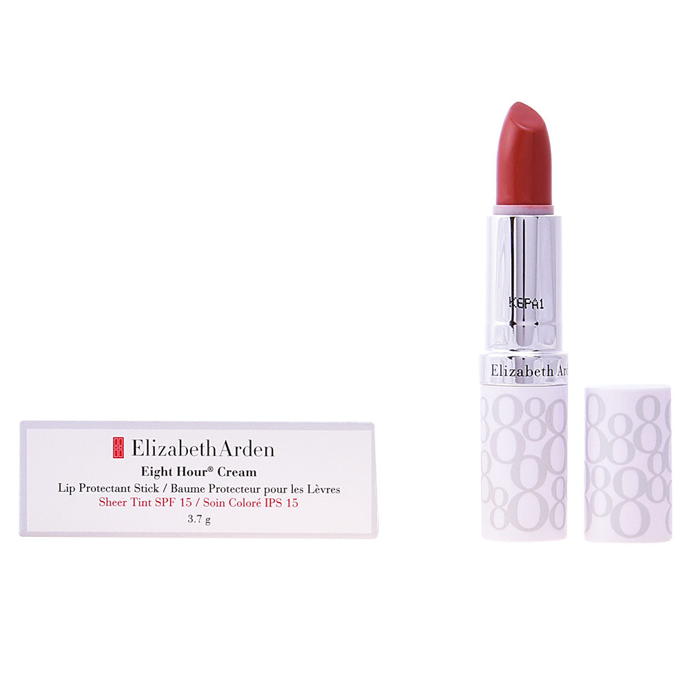 Red lipstick-style balm in silver metal tube, white patterned cap with removable top — Elizabeth Arden
