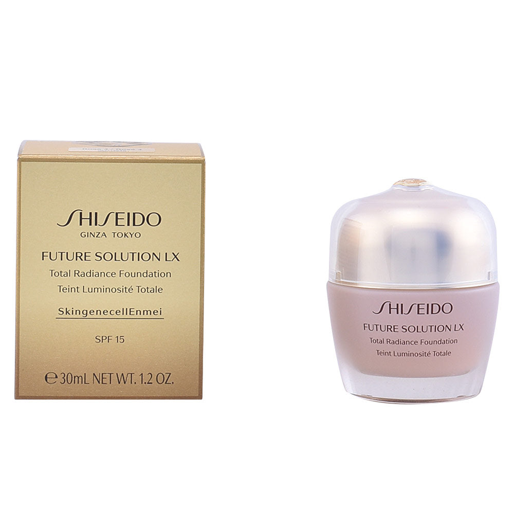 Shiseido Gold and beige foundation jar with lid beside matching box, plastic jar and cardboard box visible