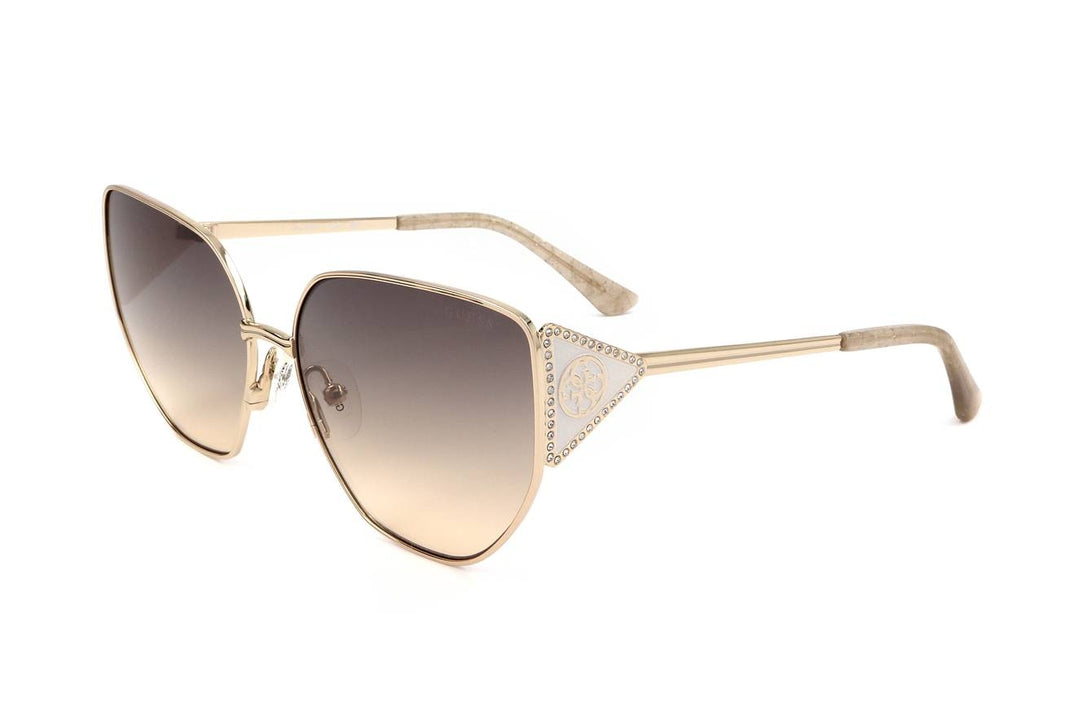 Gold oversized geometric sunglasses with gradient brown lenses and triangular rhinestone accents on temples