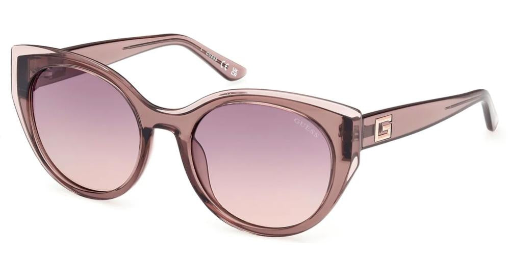 Pinkish purple retro cat-eye sunglasses on white background with gradient lenses and 'G' logos on temples