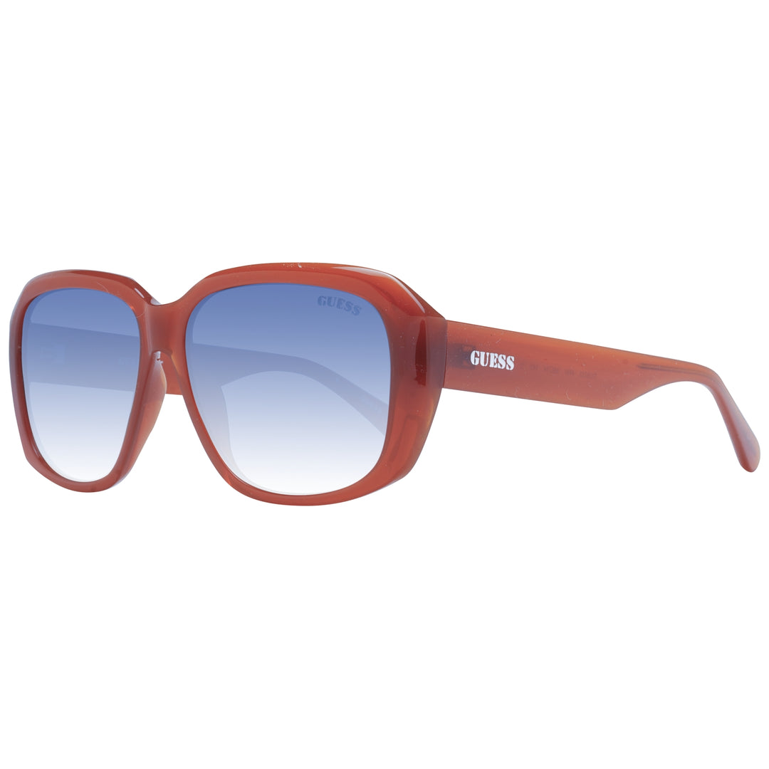 Brown plastic square sunglasses with blue gradient lenses and visible Guess logo on temple and lens
